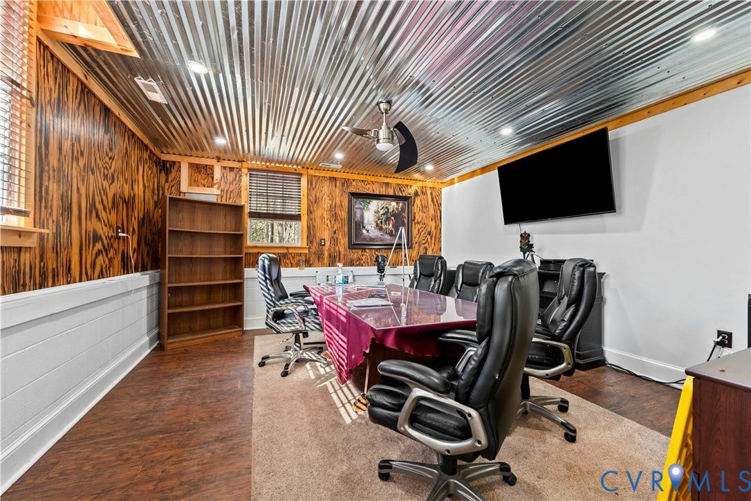 7040 Old Roxbury Road, Average, New Kent, VA 23141 Corrugated metal ceiling, exposed wood-paneled walls, built-in shelving, wood-finish flooring, and recessed lighting