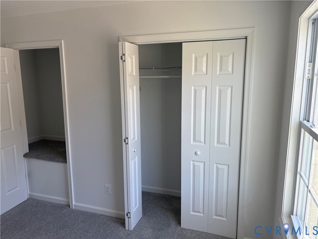 1708 Shewalt Drive, Fairfield, VA 23228 Bedroom 2 Neutral-toned wall-to-wall carpeting, bi-fold closet doors, built-in recessed shelving, and a double-hung window