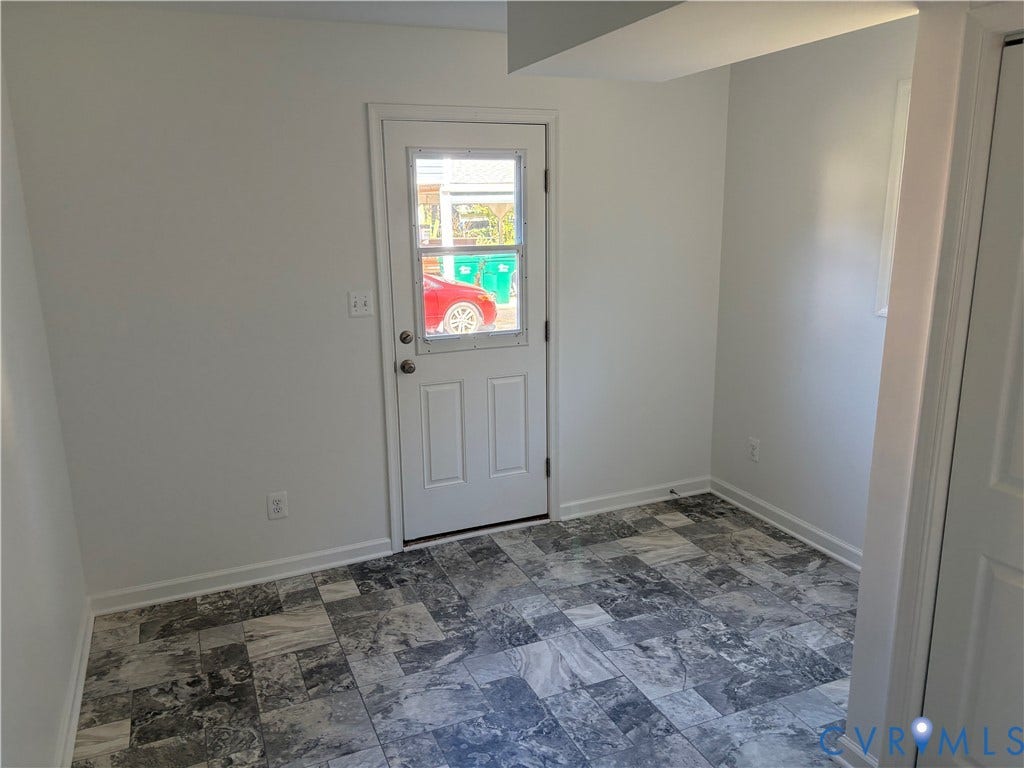 1708 Shewalt Drive, Fairfield, VA 23228 Utility/Laundry Multi-tone patterned tile flooring, neutral wall finishes, and a glass-paneled exterior door