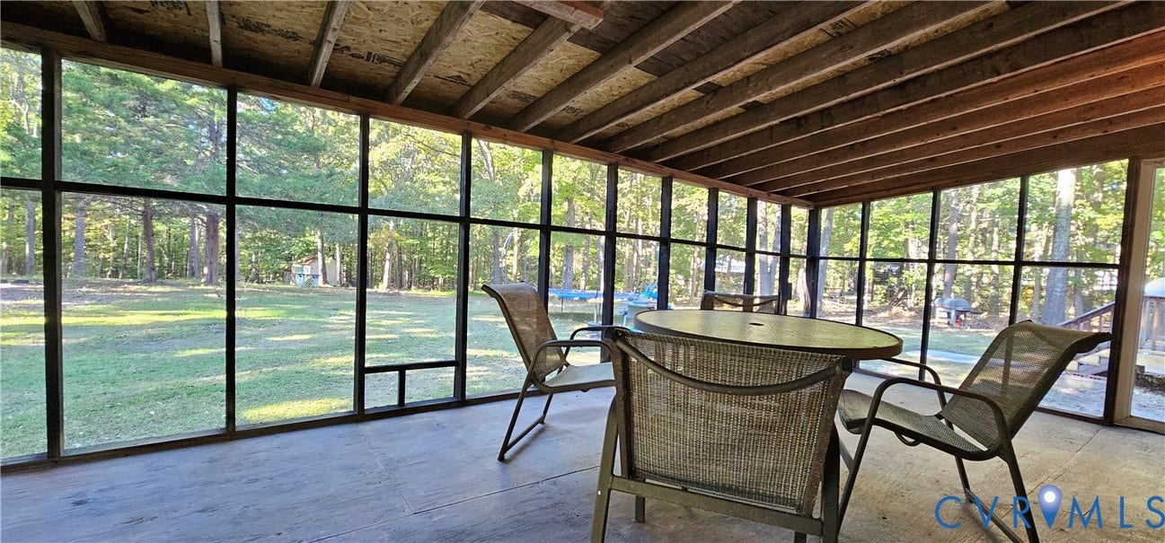 24110 Genito Road, Amelia, VA 23002 Screened-in porch featuring a flat-panel ceiling with exposed wooden rafters and full-wall mesh screening