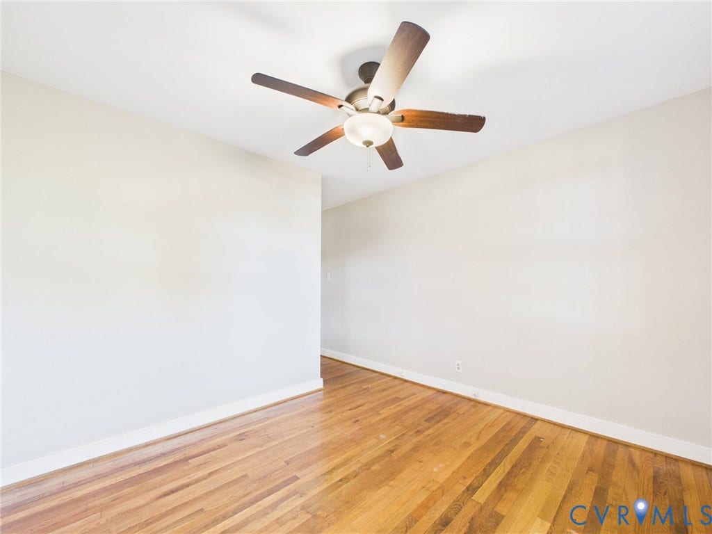 6902 Three Chopt Road, Richmond, VA 23226 Interior space featuring wood-finish flooring and a ceiling-mounted fan with an integrated light fixture