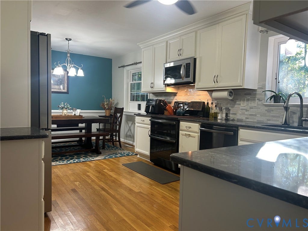 1120 Black Heath Road, Robious/Huguenot, Midlothian, VA 23113 Kitchen opens into dining space.
