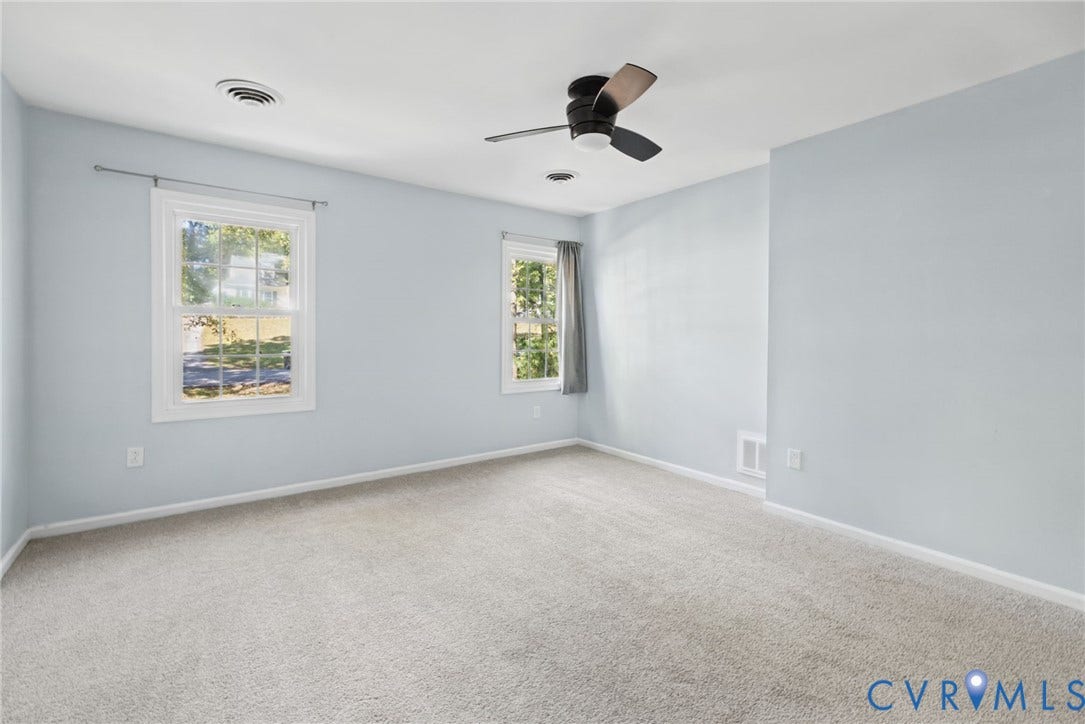 509 Overcliff Court, Walton Park, Midlothian, VA 23114 Neutral-toned interior featuring wall-to-wall carpeting, dual-pane windows with trim, and a ceiling fan