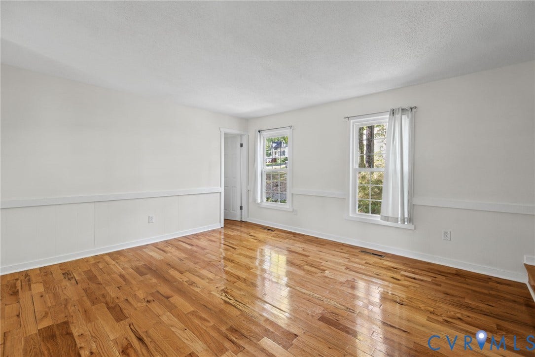 509 Overcliff Court, Walton Park, Midlothian, VA 23114 Interior room featuring wood-finish flooring, chair rail molding, and double-hung windows