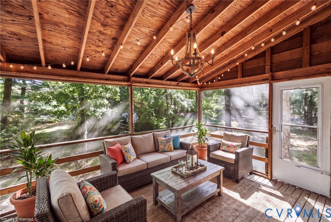 509 Overcliff Court, Walton Park, Midlothian, VA 23114 Screened-in porch featuring exposed wood-beam vaulted ceilings, wood plank walls, a decorative multi-light chandelier, and full-perimeter screening