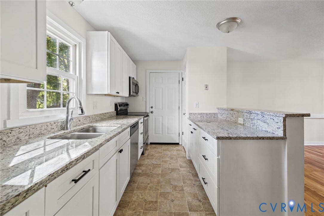 509 Overcliff Court, Walton Park, Midlothian, VA 23114 Kitchen featuring white cabinetry, light-toned stone countertops, stainless steel appliances, dual-basin stainless steel sink, and tile flooring