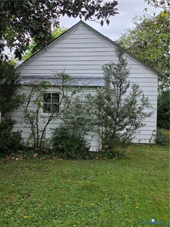 4114 Crestwood Road, Established, Richmond, VA 23227 Exterior profile featuring white lap siding, a metal shed roof, and a multi-pane window