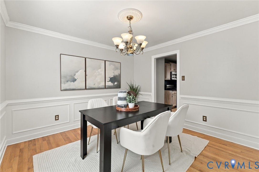 4712 Cedar Forest Road, Glen Allen, VA 23060 Elegant formal dining room with hardwood flooring, decorative picture molding and crown molding.