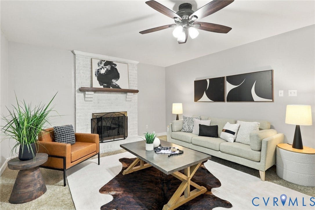 4712 Cedar Forest Road, Glen Allen, VA 23060 Inviting family room featuring a whitewashed brick fireplace, wood mantel, and ceiling fan.