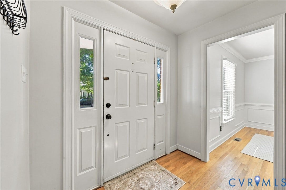 4712 Cedar Forest Road, Glen Allen, VA 23060 Bright and welcoming entryway featuring hardwood floors and a front door flanked by sidelights.