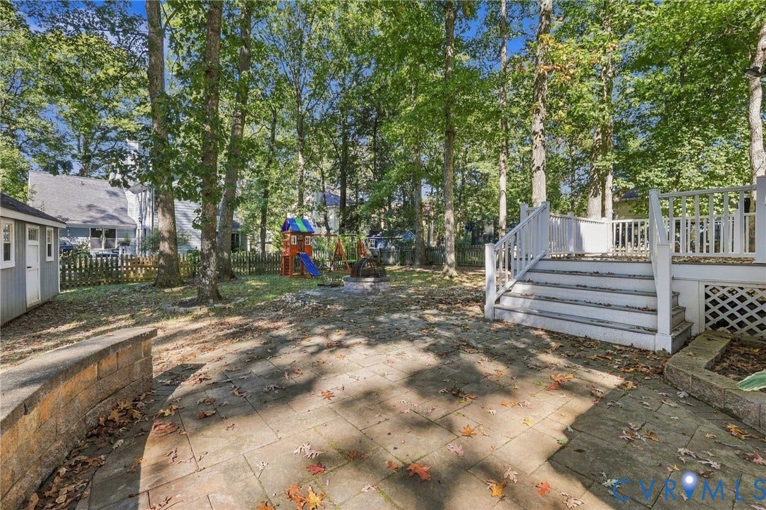 4712 Cedar Forest Road, Glen Allen, VA 23060 Spacious, tree-lined backyard featuring a paver patio, firepit area, and a nice flat lot.