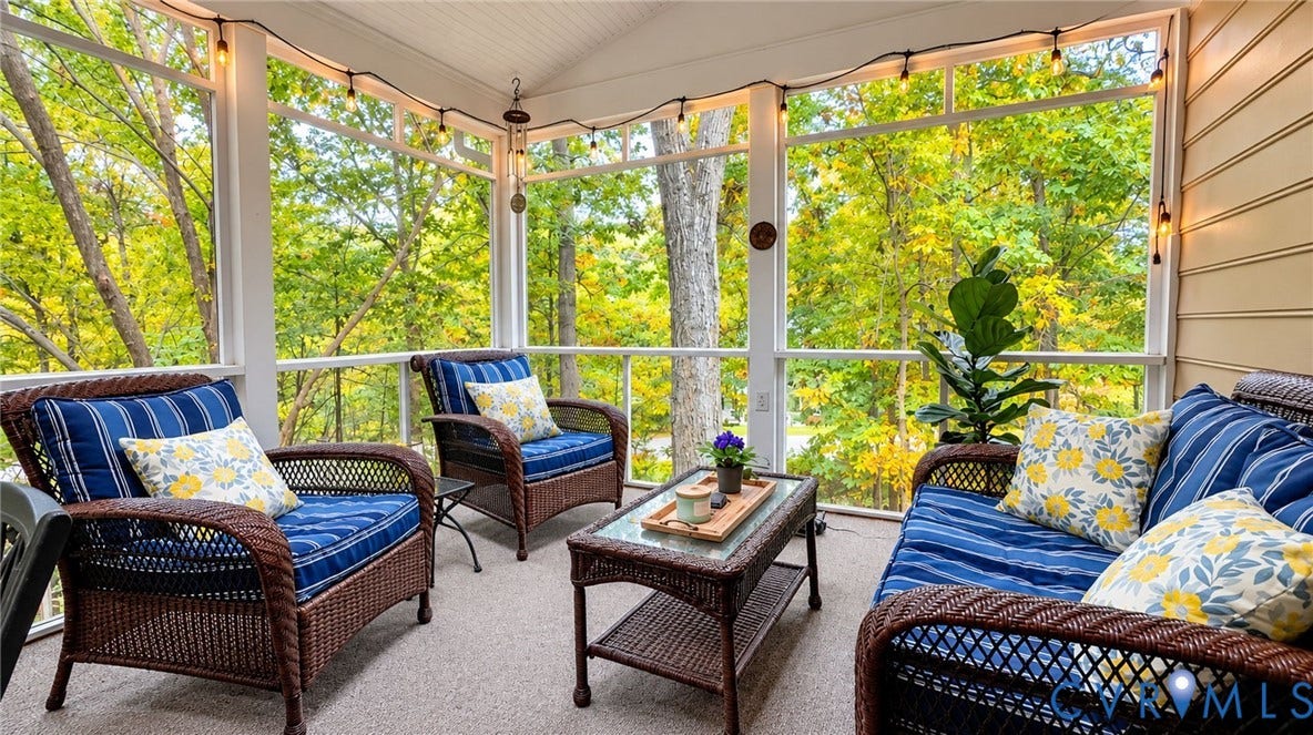2040 Normandstone Drive, Roxshire, Midlothian, VA 23113 Screened porch featuring a beadboard ceiling, neutral carpeting, horizontal lap siding, and expansive floor-to-ceiling screens showcasing surrounding trees