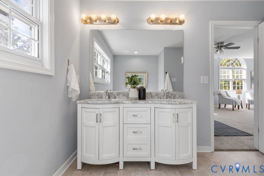 4011 Echo Ridge Place, Midlothian, VA 23112 Primary Ensuite with dual-sink vanity with stone countertop, jetted soaking tub and shower.