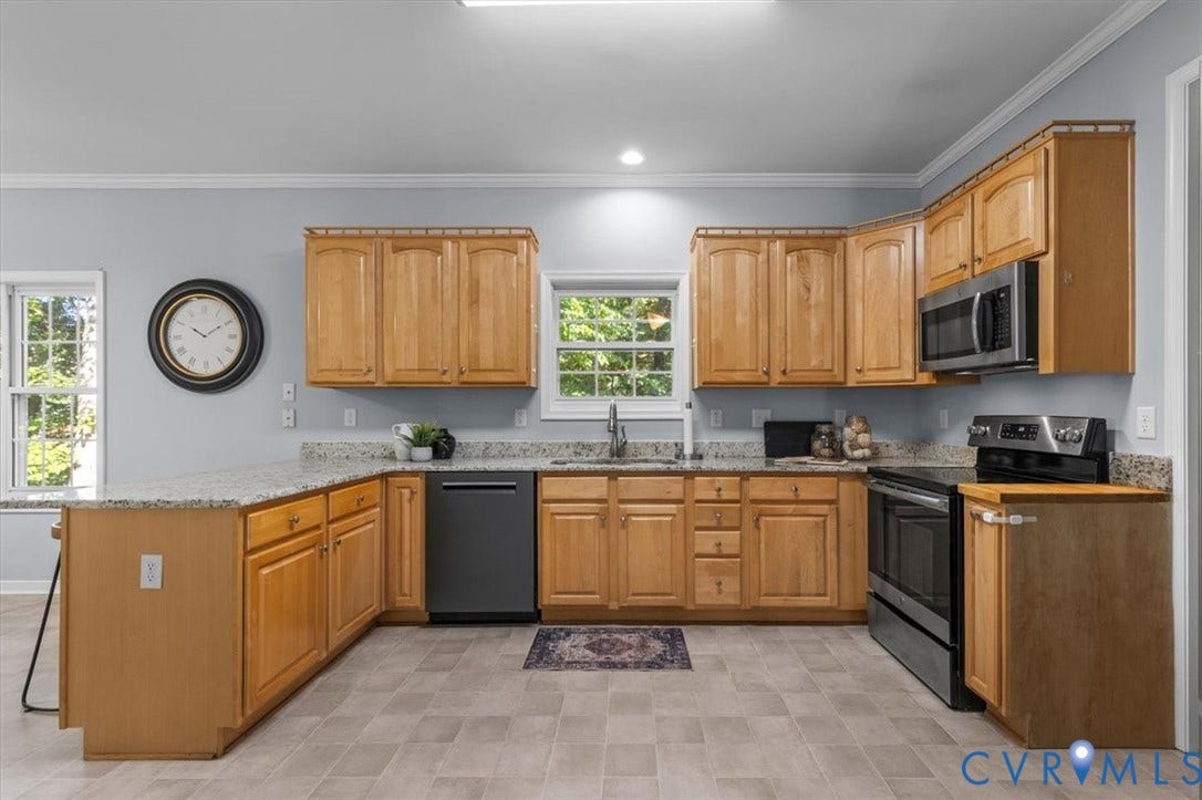 4011 Echo Ridge Place, Midlothian, VA 23112 Kitchen featuring natural wood cabinetry, Granite countertops, stainless steel appliances, and vinyl flooring