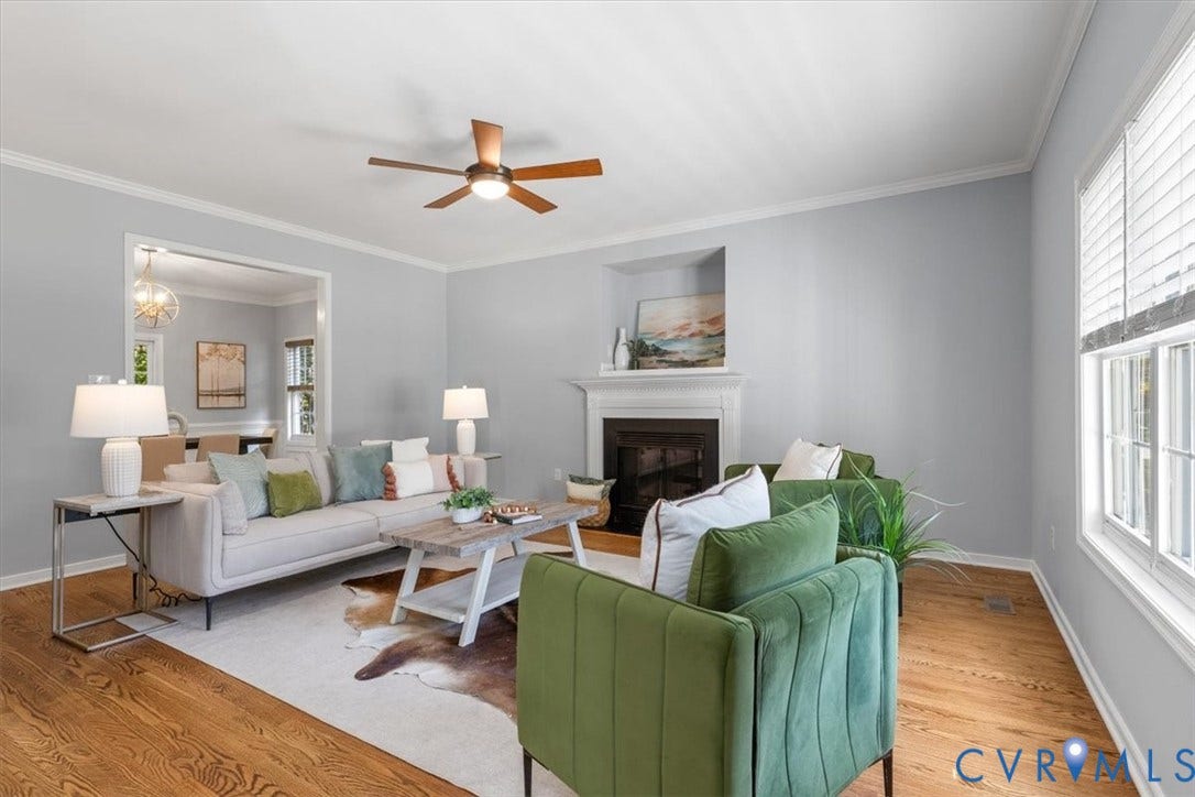 4011 Echo Ridge Place, Midlothian, VA 23112 Living area featuring wood flooring, a fireplace, crown molding, and ceiling fan