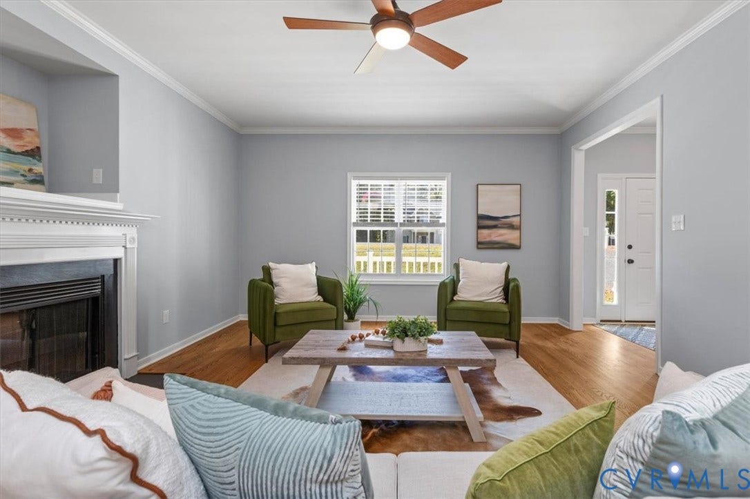 4011 Echo Ridge Place, Midlothian, VA 23112 Living area featuring wood flooring, a fireplace, crown molding, and ceiling fan