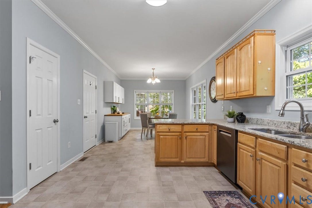 4011 Echo Ridge Place, Midlothian, VA 23112 Kitchen featuring natural wood cabinetry, Granite countertops, stainless steel appliances, and vinyl flooring