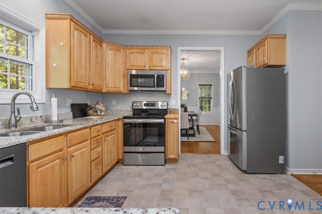 4011 Echo Ridge Place, Midlothian, VA 23112 Kitchen featuring natural wood cabinetry, Granite countertops, stainless steel appliances, and vinyl flooring