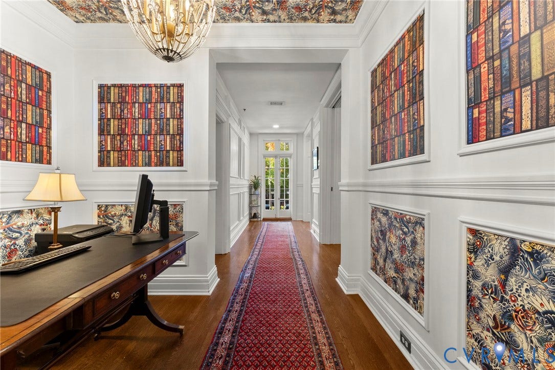 2416 Park Avenue, #U4, The Fan District, Richmond, VA 23220 Hardwood flooring, decorative wall paneling with patterned inlays, ceiling-mounted metal chandelier, and double glass-paned doors