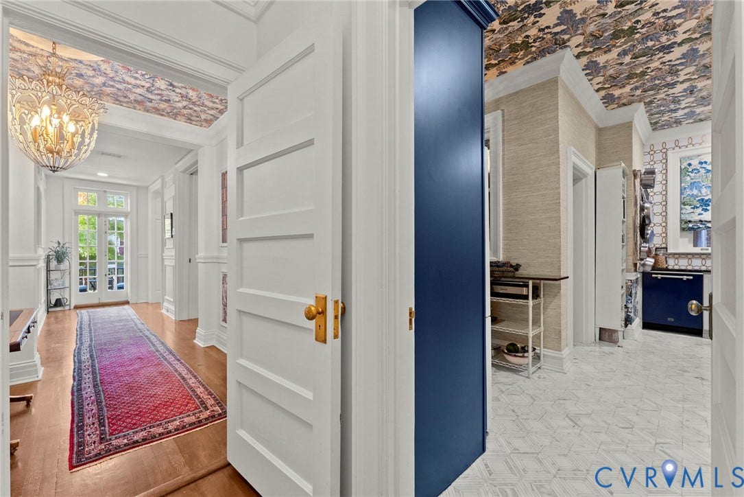 2416 Park Avenue, #U4, The Fan District, Richmond, VA 23220 Entryway featuring wood-finish flooring, ornate multi-arm chandelier, and decorative wallpapered ceiling