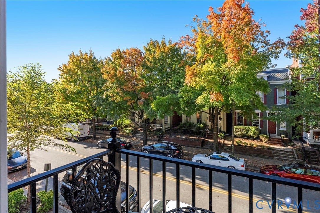 2416 Park Avenue, #U4, The Fan District, Richmond, VA 23220 Elevated exterior balcony featuring black metal railings and mature trees
