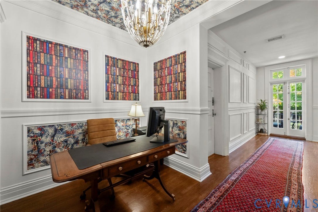 2416 Park Avenue, #U4, The Fan District, Richmond, VA 23220 Custom millwork featuring wainscoting and picture frame molding, decorative wallpaper inlay, hardwood flooring, crystal chandelier, and glass-paned French doors
