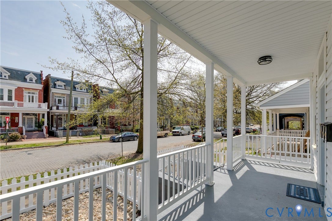620 Chimborazo Boulevard, Church Hill, Richmond, VA 23223 Covered front porch featuring a painted concrete floor, white spindle railings, square structural columns, and a beadboard ceiling