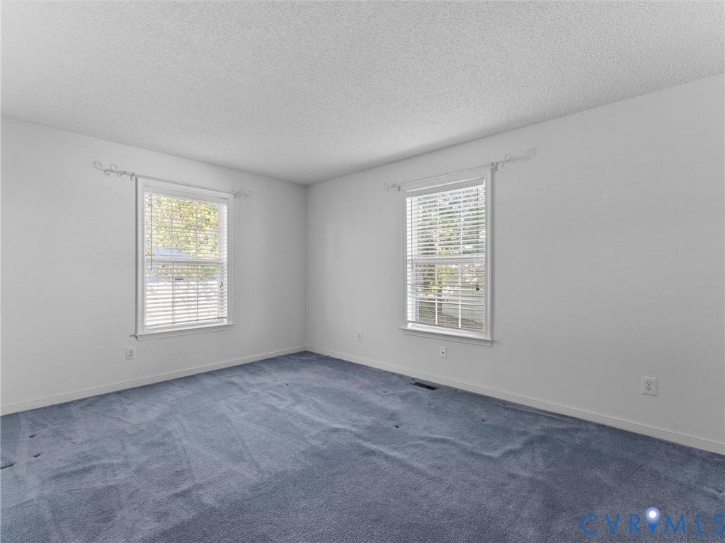 9520 Willow Ridge Drive, Glen Allen, VA 23060 Neutral interior featuring wall-to-wall carpeting, white walls, and dual double-hung windows with white frames and blinds