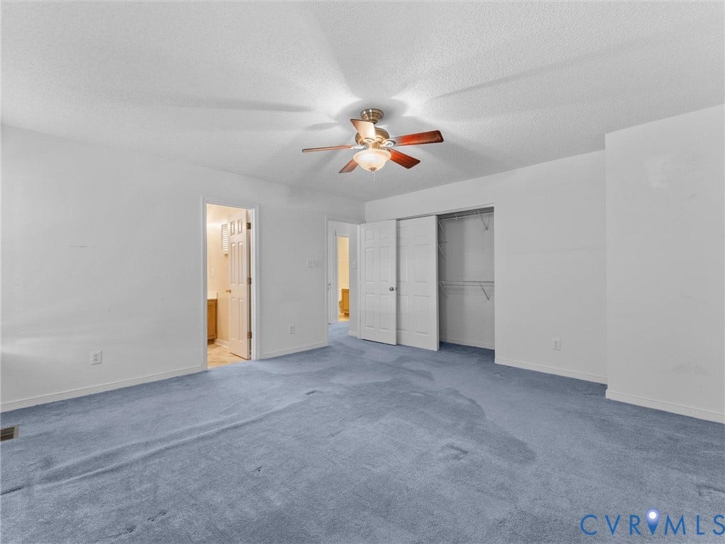 9520 Willow Ridge Drive, Glen Allen, VA 23060 Room featuring wall-to-wall carpeting, a central ceiling fan with integrated lighting, and a closet with double-panel doors