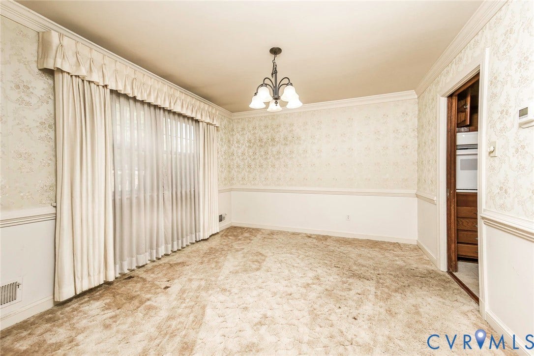 4511 Inca Drive, Ampthill, VA 23237 Room featuring decorative wallpaper, crown molding, chair rail trim, and a multi-arm chandelier