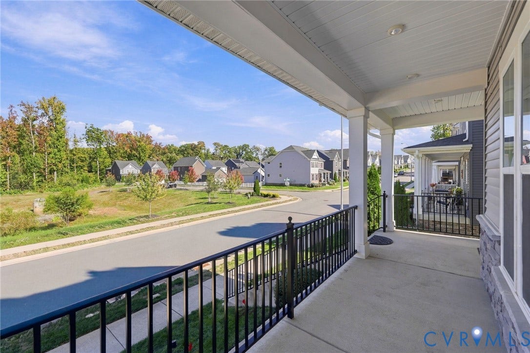 1716 German School Road, Westlake Heights, Richmond, VA 23225 Covered front porch featuring a concrete floor, beadboard ceiling, recessed lighting, and black metal railings