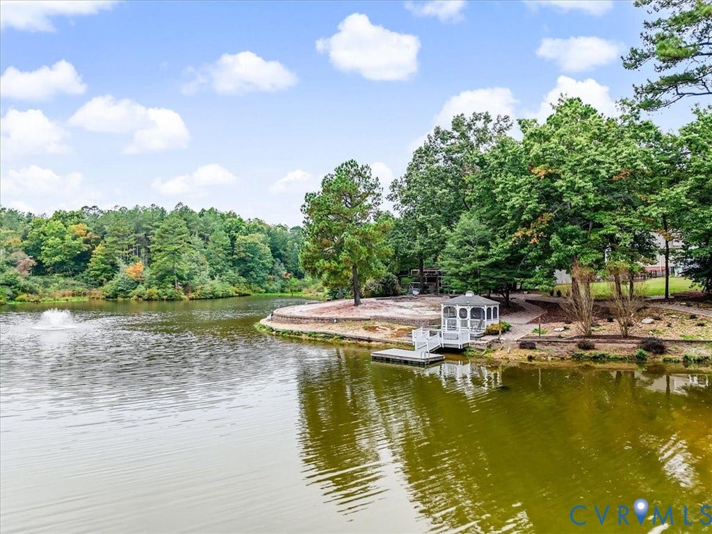 6650 Vintage Rose Lane, New Kent, VA 23140 Pond featuring a fountain. Gazebo overlooking pond with dock.