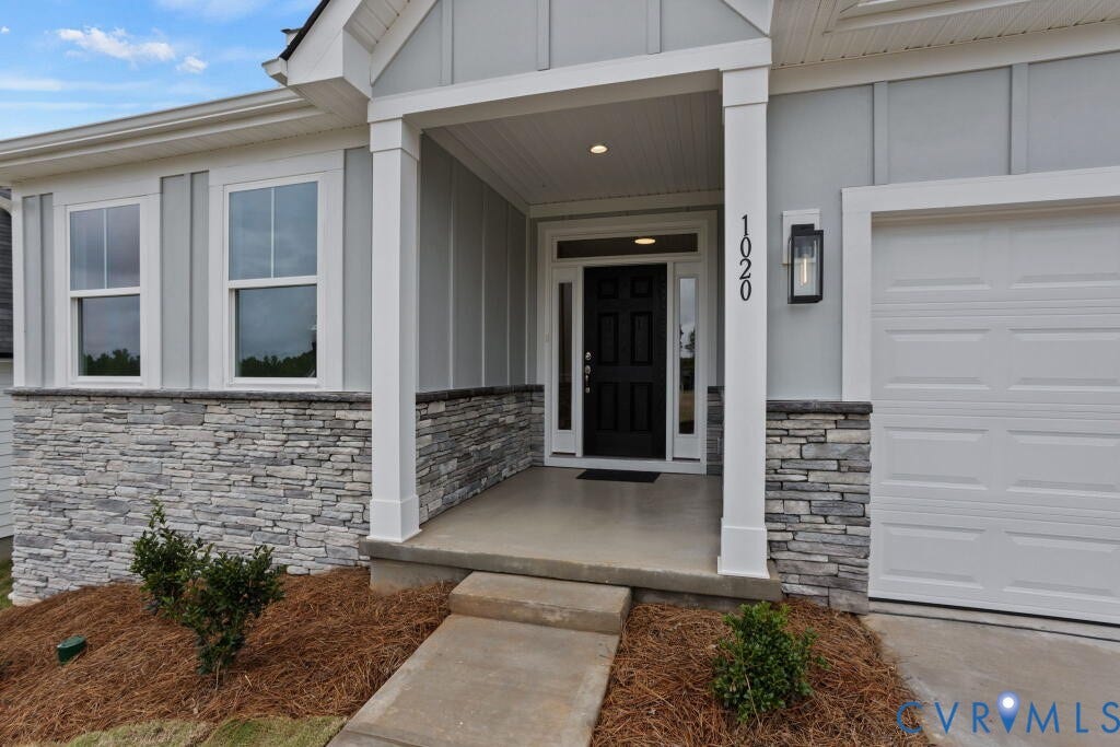 5614 Stingray Point Boulevard, Greenwood Estates, New Kent, VA 23124 This home is TO BE BUILT. The photo represents the plan, not the actual home. Design selections may vary.
