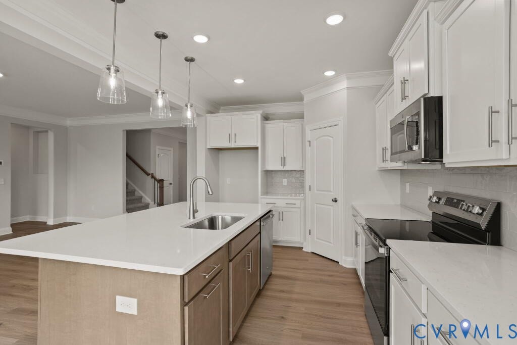 5614 Stingray Point Boulevard, Greenwood Estates, New Kent, VA 23124 This home is TO BE BUILT. The photo represents the plan, not the actual home. Design selections may vary.