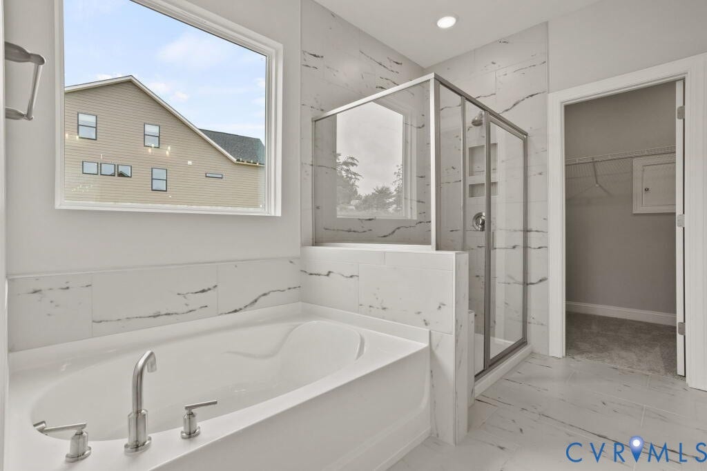 5614 Stingray Point Boulevard, Greenwood Estates, New Kent, VA 23124 This home is TO BE BUILT. The photo represents the plan, not the actual home. Design selections may vary.