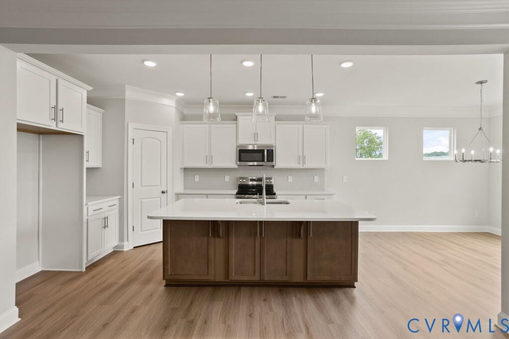 5614 Stingray Point Boulevard, Greenwood Estates, New Kent, VA 23124 This home is TO BE BUILT. The photo represents the plan, not the actual home. Design selections may vary.