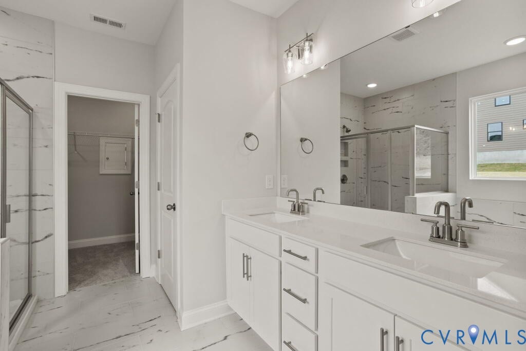 5614 Stingray Point Boulevard, Greenwood Estates, New Kent, VA 23124 This home is TO BE BUILT. The photo represents the plan, not the actual home. Design selections may vary.