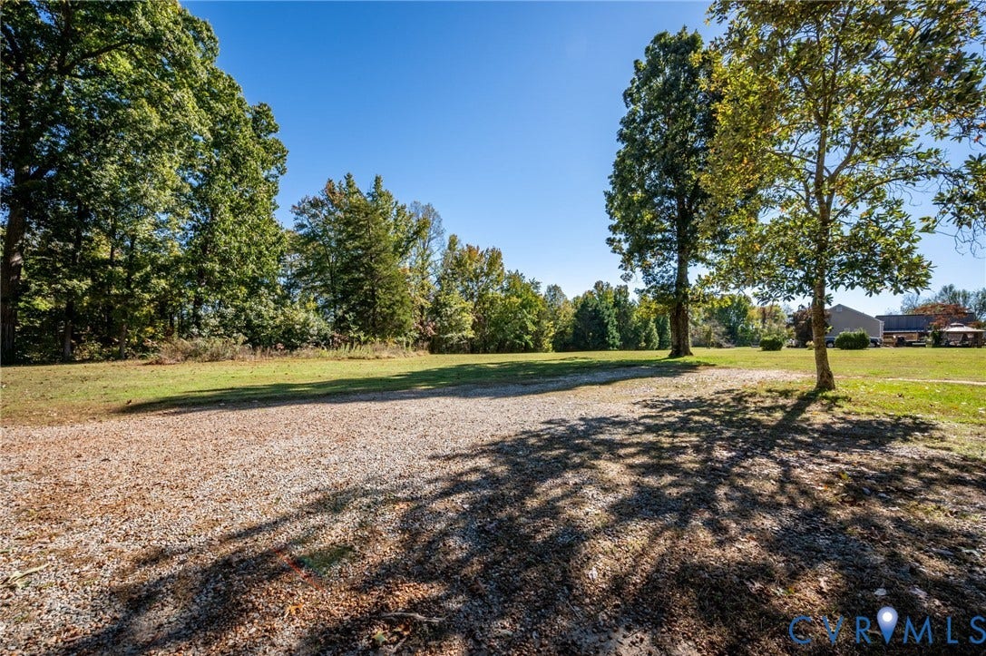 2790 Maidens Road, Powhatan, VA 23139 Expansive grounds out front with an abundance of parking options, & expansive yard.