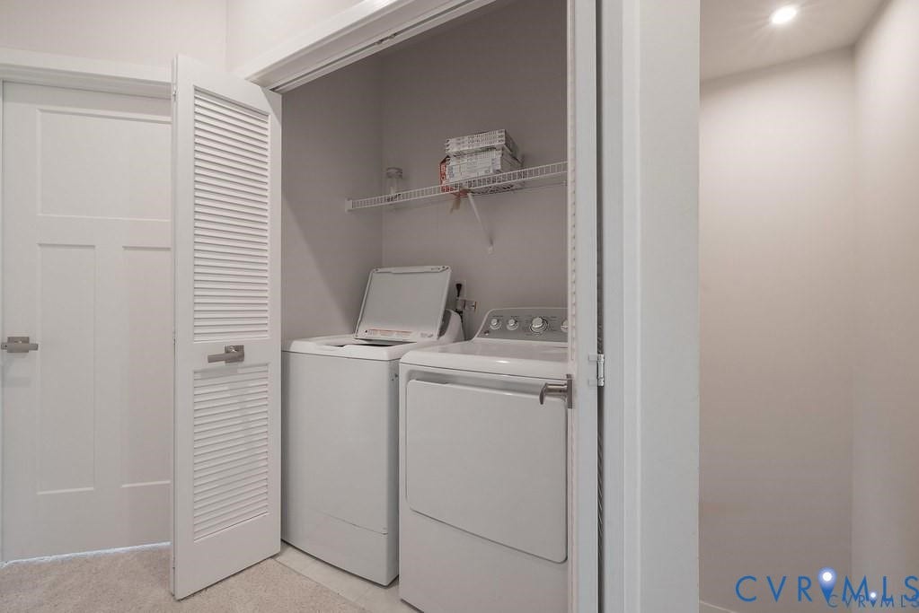 10221 Wenden Way, Hanover, VA 23005 Laundry closet featuring white louvered doors, wire shelving, and recessed ceiling lighting