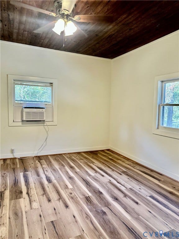 15051 BENT CREEK ROAD, Morven, Amelia, VA 23002 Room interior featuring wood-finish flooring, a dark-stained wood-paneled ceiling, and a ceiling-mounted light fixture with a central fan