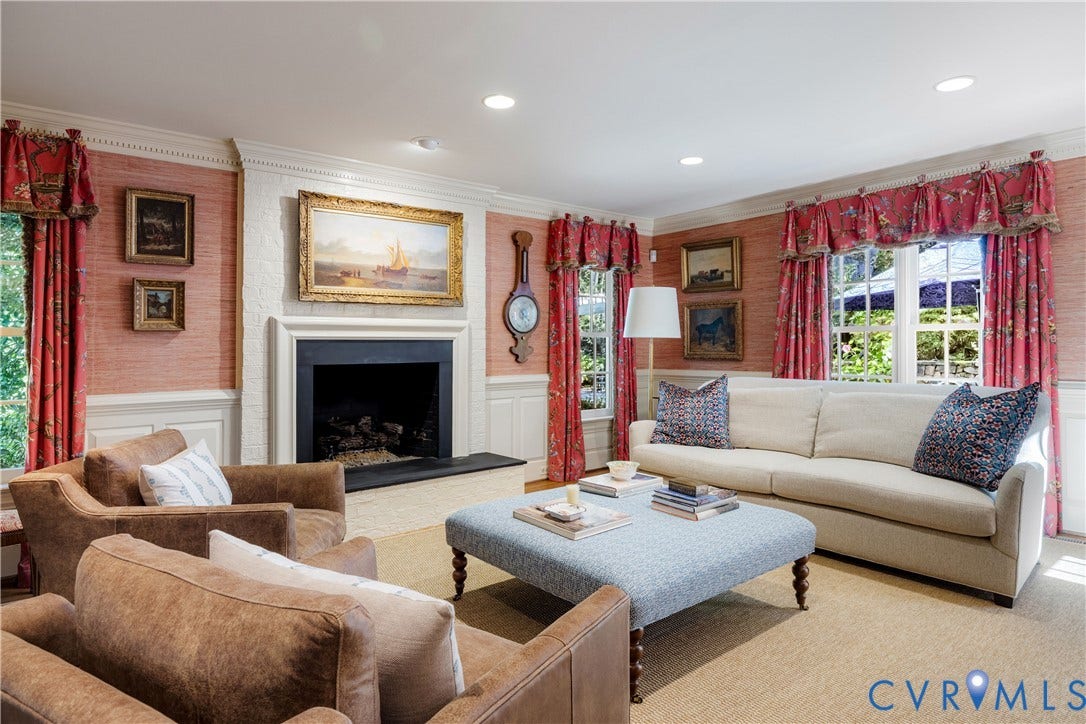 205 Poplar Lane, South Of Cary Street Rd, Richmond, VA 23226 Handsome wall coverings, mouldings and the painted brick fireplace add to the appeal of this special gathering space.