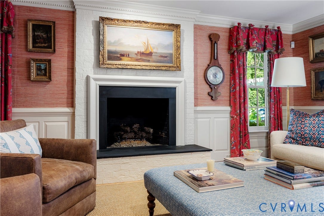 205 Poplar Lane, South Of Cary Street Rd, Richmond, VA 23226 Painted brick fireplace with gas logs features black hearth and surround plus decorative crown moulding and wainscoting.