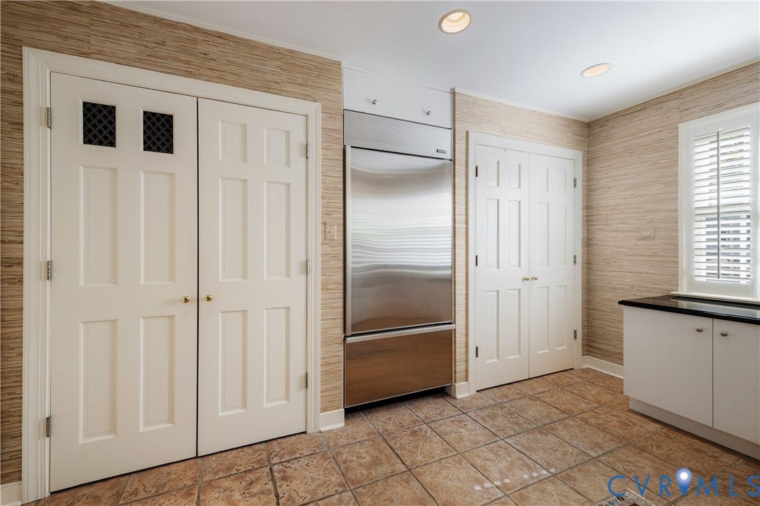 205 Poplar Lane, South Of Cary Street Rd, Richmond, VA 23226 This wall of closets includes space for a second full-size Sub-Zero refrigerator and freezer.