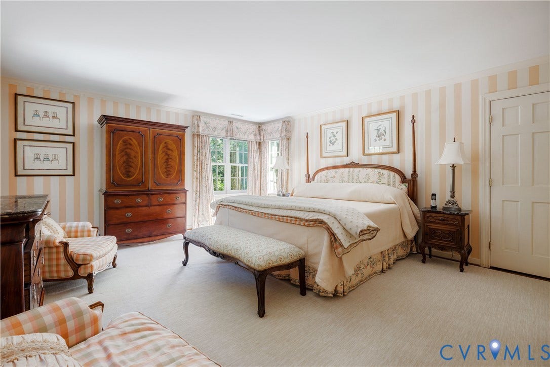 205 Poplar Lane, South Of Cary Street Rd, Richmond, VA 23226 The primary bedroom features wall-to-wall carpeting, a windowed corner alcove and two double closets.