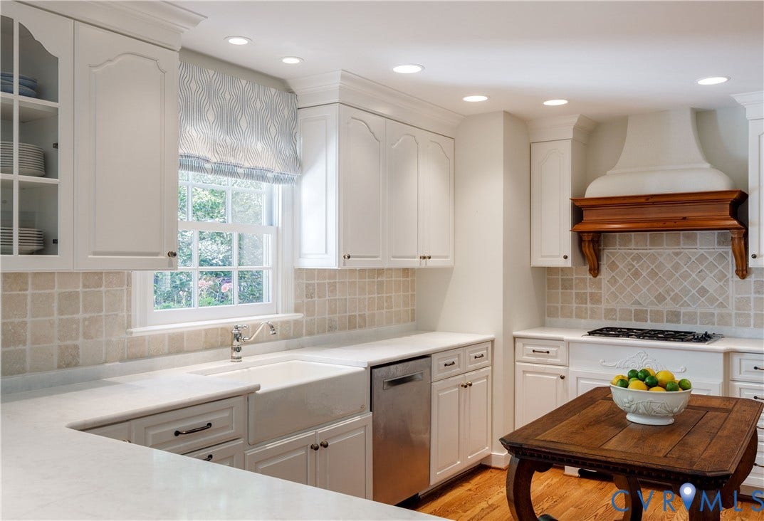 205 Poplar Lane, South Of Cary Street Rd, Richmond, VA 23226 The farmhouse sink is topped by a window with views to the garden.