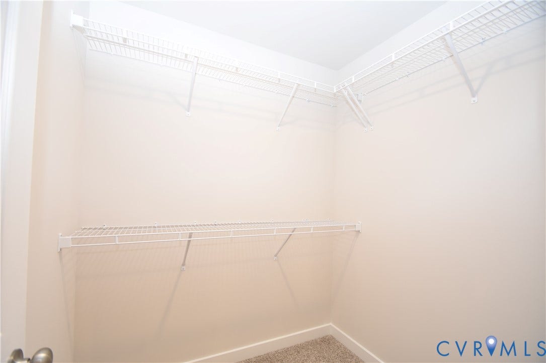 Lot 1 Bannister Town Road, Courtney Farms, Louisa, VA 23093 Walk-in closet featuring white wire shelving and neutral wall-to-wall carpeting