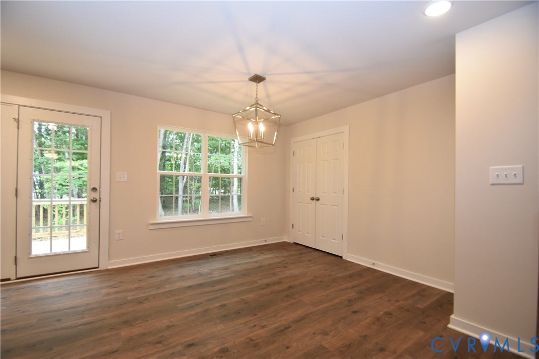 Lot 1 Bannister Town Road, Courtney Farms, Louisa, VA 23093 Wood-finish flooring, lantern-style pendant light fixture, double-door closet, multi-lite glass door, and double-hung window