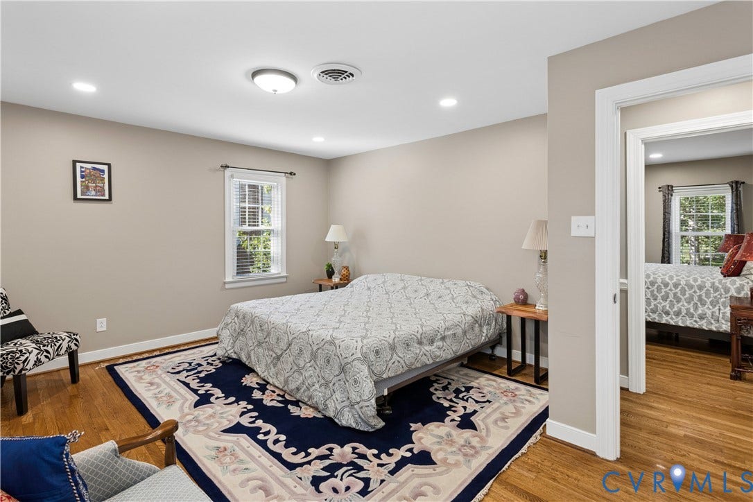 327 Huddersfield Drive, Chesterfield, VA 23236 Neutral wall paint, wood-finish flooring, recessed lighting, and multi-pane windows