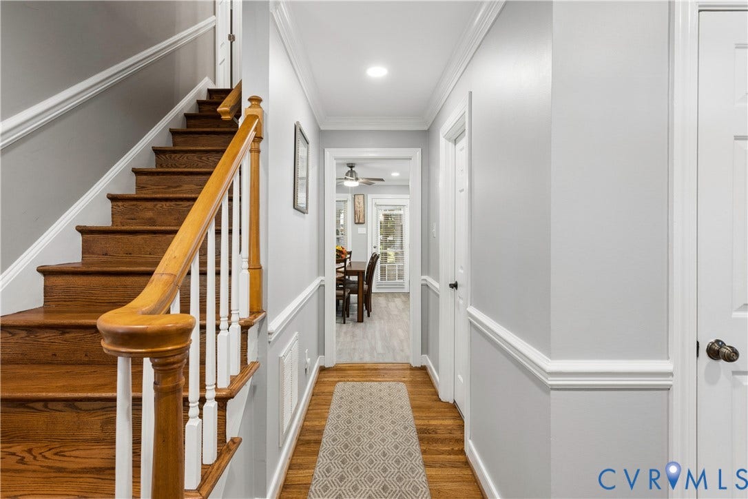 327 Huddersfield Drive, Chesterfield, VA 23236 Staircase featuring wood-finish treads, white balusters, and a wooden handrail, complemented by crown molding, chair rail trim, and recessed lighting