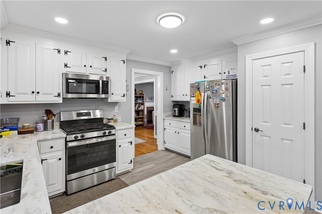 327 Huddersfield Drive, Chesterfield, VA 23236 Kitchen featuring white cabinetry with exposed hinges, stone-surfaced countertops, stainless steel appliances, recessed lighting, and wood-finish flooring